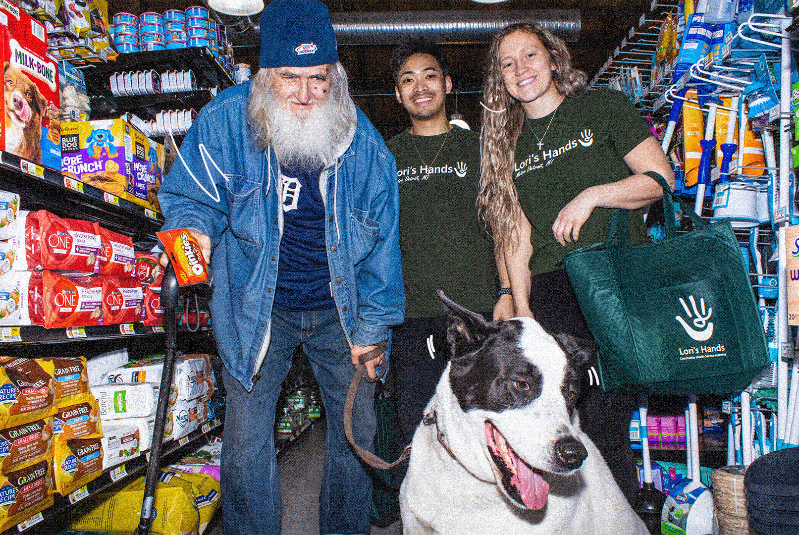 cg-report-2025__photos__group-with-dog 2 young people with an older man and a dog in a grocery store