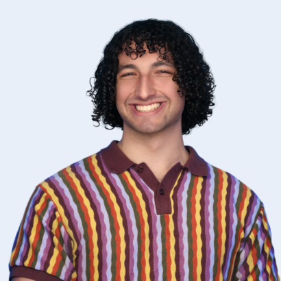 Professional headshot of Alex Edgar